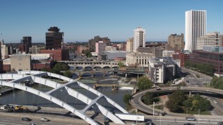 DX0002_207_037 - 5.7K aerial stock footage flyby and descend near the Douglass-Anthony Bridge with view of river and Downtown Rochester, New York