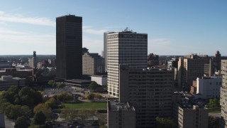 DX0002_208_002 - 5.7K aerial stock footage of orbiting Xerox Tower and Five Star Bank Plaza in Downtown Rochester, New York