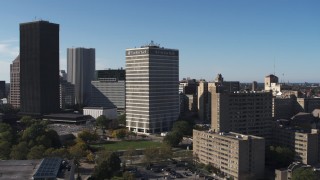 DX0002_208_008 - 5.7K aerial stock footage focus on Five Star Bank Plaza, flyby apartment complex in Downtown Rochester, New York