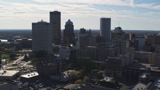 DX0002_208_011 - 5.7K aerial stock footage of the city skyline seen while flying near Five Star Bank Plaza, Downtown Rochester, New York