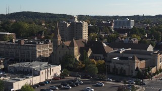 DX0002_208_025 - 5.7K aerial stock footage ascend while focused on a church in Rochester, New York