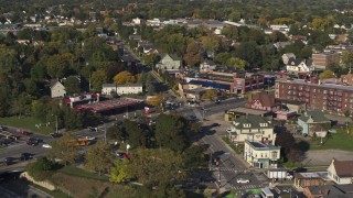 DX0002_208_027 - 5.7K aerial stock footage slowly orbit the intersection of Main and Union Streets in Rochester, New York
