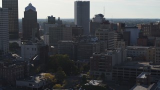 DX0002_208_039 - 5.7K aerial stock footage orbit apartment building in Downtown Rochester, New York