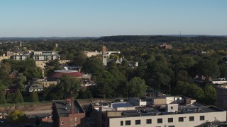 DX0002_208_041 - 5.7K aerial stock footage focus on church steeple during descent in Rochester, New York