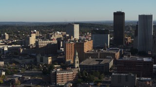 DX0002_209_004 - 5.7K aerial stock footage stationary view of apartment building near high-rises, Downtown Rochester, New York