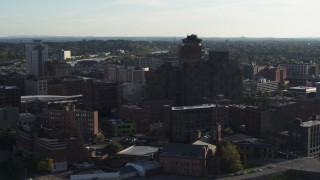 DX0002_209_006 - 5.7K aerial stock footage of flying by Andrews Terrace apartment building, Downtown Rochester, New York