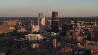 DX0002_209_031 - 5.7K aerial stock footage orbit First Federal Plaza and office buildings at sunset, Downtown Rochester, New York