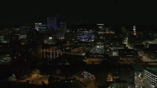 DX0002_210_037 - 5.7K aerial stock footage of the Genesee River and skyline at night, Downtown Rochester, New York