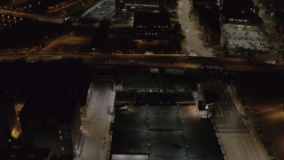 DX0002_210_057 - 5.7K aerial stock footage of light traffic on the Inner Loop at night, Downtown Rochester, New York