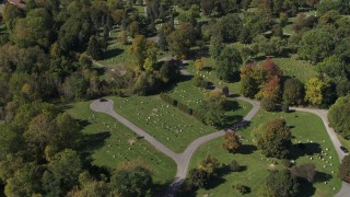 DX0002_211_005 - 5.7K aerial stock footage of paths and graves at Morningside Cemetery in Syracuse, New York