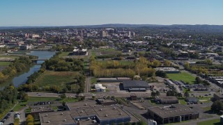 DX0002_211_012 - 5.7K aerial stock footage of a wide view of Downtown Syracuse, New York from Onondaga Creek
