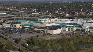 DX0002_211_027 - 5.7K aerial stock footage of a reverse view of a shopping mall in Syracuse, New York