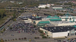 DX0002_211_029 - 5.7K aerial stock footage of flying toward a shopping mall in Syracuse, New York