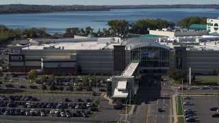 DX0002_212_011 - 5.7K aerial stock footage of a close orbit of the Destiny USA shopping mall in Syracuse, New York