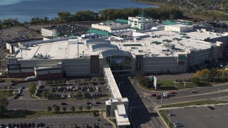 DX0002_212_024 - 5.7K aerial stock footage a reverse view of the Destiny USA shopping mall, Syracuse, New York