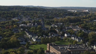 DX0002_213_002 - 5.7K aerial stock footage of church steeples and homes in Syracuse, New York