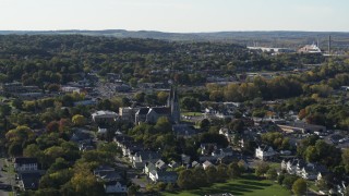 DX0002_213_006 - 5.7K aerial stock footage of orbiting a church and residential neighborhood in Syracuse, New York