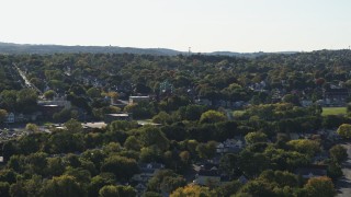 DX0002_213_008 - 5.7K aerial stock footage of a Catholic church and a neighborhood in Syracuse, New York