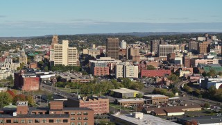 DX0002_213_015 - 5.7K aerial stock footage of slowly approaching office buildings in Downtown Syracuse, New York