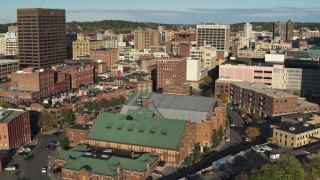 DX0002_213_030 - 5.7K aerial stock footage of orbiting the science museum, Downtown Syracuse, New York
