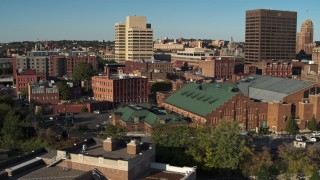 DX0002_213_034 - 5.7K aerial stock footage of an orbit of the Museum of Science & Technology and office buildings, Downtown Syracuse, New York