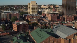 DX0002_213_039 - 5.7K aerial stock footage of ascending by museum to reveal office buildings, Downtown Syracuse, New York