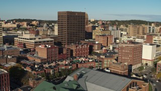 DX0002_213_040 - 5.7K aerial stock footage of orbiting the Chase Tower office high-rise, Downtown Syracuse, New York