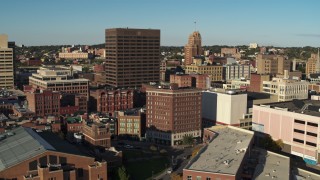DX0002_213_042 - 5.7K aerial stock footage pass apartment building to reveal Chase Tower, Downtown Syracuse, New York
