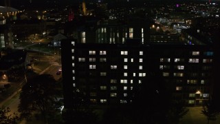 DX0002_215_009 - 5.7K stock footage aerial video of orbiting university dormitory at twilight, Syracuse, New York