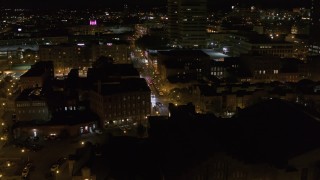 DX0002_215_022 - 5.7K aerial stock footage approaching Franklin Street at night, Downtown Syracuse, New York