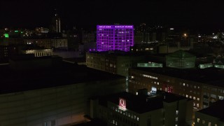 DX0002_215_028 - 5.7K aerial stock footage orbit Barclay Damon Tower office buildings at night, Downtown Syracuse, New York