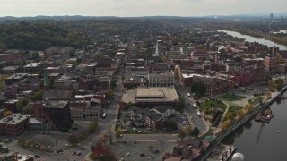 DX0002_216_003 - 5.7K aerial stock footage ascend and orbit the downtown area of Troy, New York