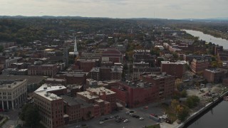 DX0002_216_004 - 5.7K aerial stock footage descend and orbit the downtown area of Troy, New York