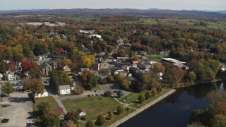 DX0002_216_020 - 5.7K aerial stock footage orbit and approach a small town intersection in Fort Edward, New York