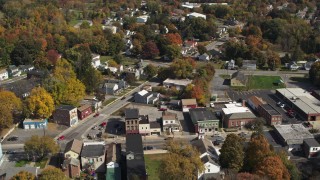 DX0002_216_021 - 5.7K aerial stock footage orbit buildings around a small town intersection in Fort Edward, New York