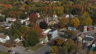 DX0002_216_023 - 5.7K aerial stock footage orbit and fly away from St Joseph's Church in Fort Edward, New York