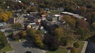 DX0002_216_027 - 5.7K aerial stock footage fly over the river toward a small town, Fort Edward, New York