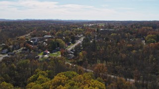 DX0002_216_031 - 5.7K aerial stock footage of a wide orbit of the small town of Fort Ann, New York
