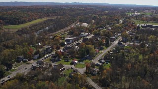 DX0002_216_035 - 5.7K aerial stock footage of an orbit of George Street through the small town of Fort Ann, New York