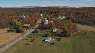 DX0002_217_013 - 5.7K aerial stock footage circling Main Street in a small town in autumn, Orwell, Vermont