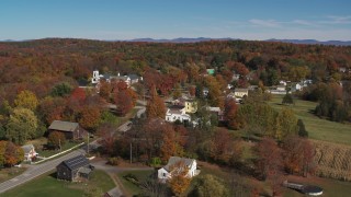 DX0002_217_016 - 5.7K aerial stock footage orbit around Main Street a small town in autumn, Orwell, Vermont