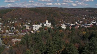 DX0002_218_004 - 5.7K aerial stock footage of orbiting the state capitol building and downtown in Montpelier, Vermont