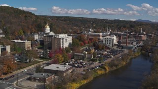 DX0002_218_016 - 5.7K aerial stock footage fly over river toward government office and state capitol building, Montpelier, Vermont