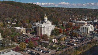 DX0002_218_024 - 5.7K aerial stock footage reverse view of government office building and state capitol building, Montpelier, Vermont