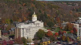 DX0002_218_035 - 5.7K aerial stock footage of the state capitol behind a government office building, Montpelier, Vermont