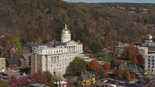 DX0002_218_036 - 5.7K aerial stock footage of approaching the state capitol behind a government office building, Montpelier, Vermont
