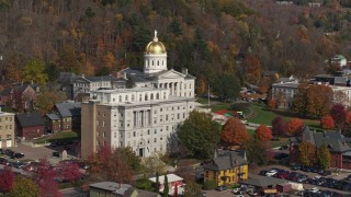 DX0002_218_038 - 5.7K aerial stock footage fly toward the state capitol dome behind a government office building, Montpelier, Vermont