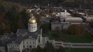 DX0002_219_001 - 5.7K aerial stock footage of orbiting the golden dome of the Vermont State House in Montpelier