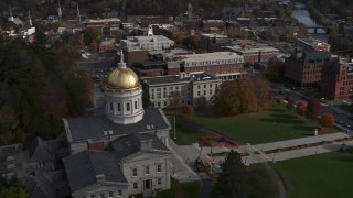 DX0002_219_002 - 5.7K aerial stock footage circling the golden dome of the Vermont State House in Montpelier