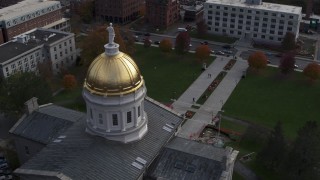 DX0002_219_006 - 5.7K aerial stock footage of flying away from the Vermont State House dome in Montpelier
